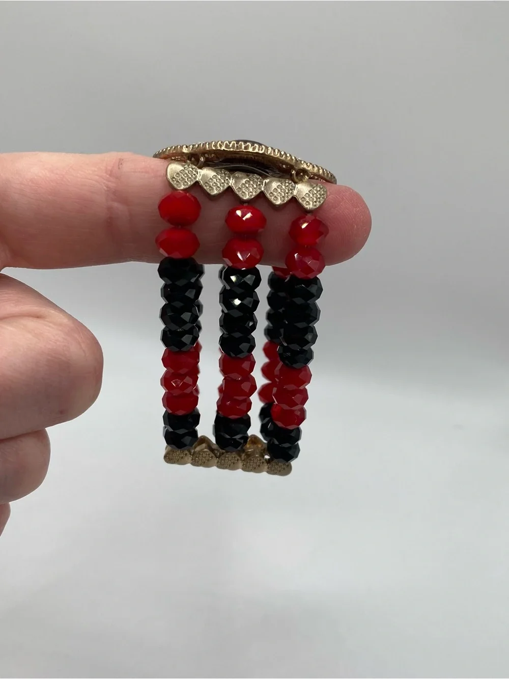 Elegant Red and Black Beaded Statement Bracelet - Gold Accent